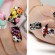 Black-Nail-Tips-with-Large-3d-Spider-Nail-Art-and-3d-Bat-with-Red-Broken-Heart-[umpkins